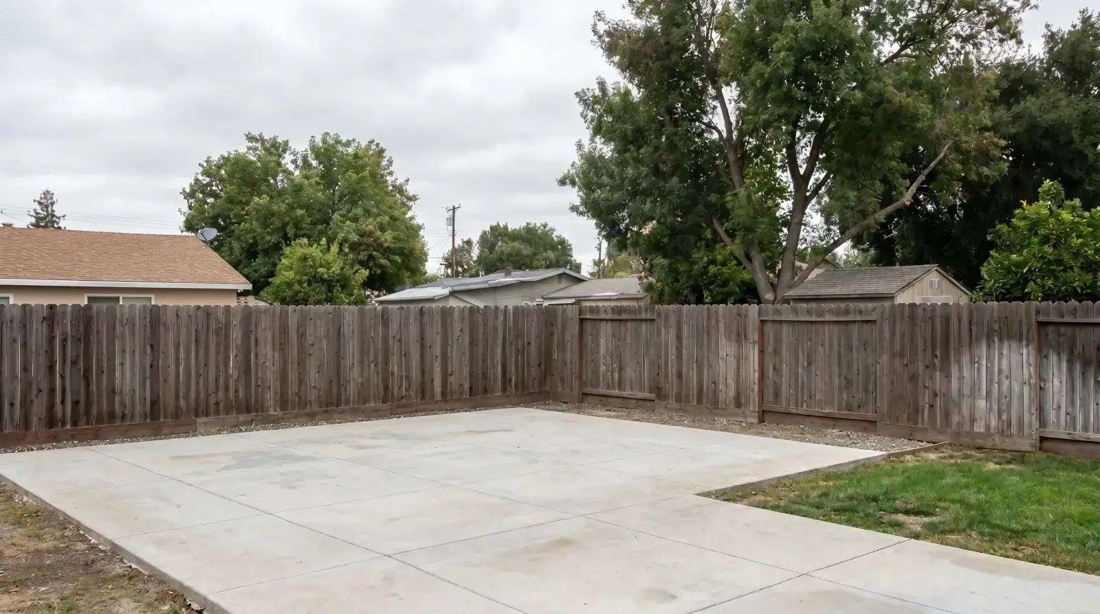 Empty Sacramento backyard before the ADU build